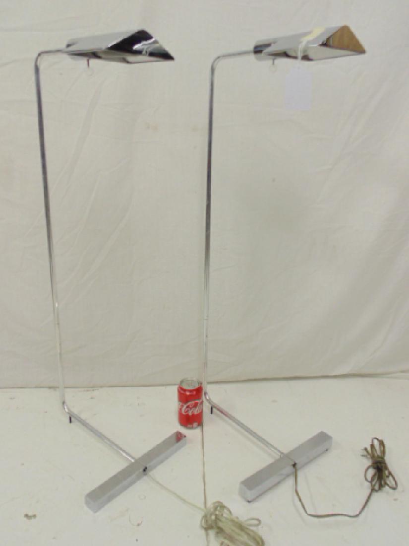 Pair chrome Cedric Hartman floor lamps, two chrome Mid: Pair chrome Cedric Hartman floor lamps, two chrome Mid Century floor lamps with chrome shades, caps, both have original Lucite switch knob, one lamp is missing its two rear "feet", both signed, height