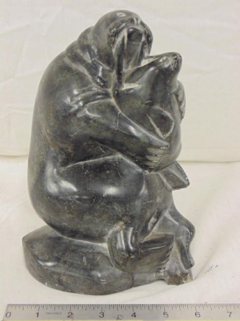 Inuit stone carving, walrus embracing cub, signed Jimmy: Inuit stone carving, walrus embracing cub, signed Jimmy Smith, "Canadian Eskimo Art" label, height is 9"