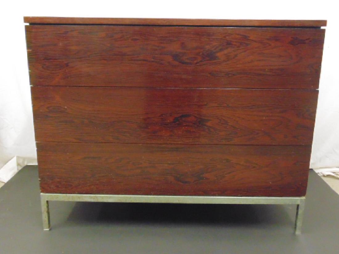 Knoll 3 drawer rosewood chest on steel base, cabinet: Knoll 3 drawer rosewood chest on steel base, cabinet size is 36" by 19.25", height is 28.5", minor veneer damage top left, rust on base