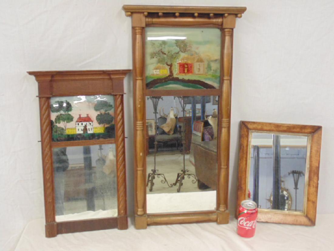 3 antique mirrors, includes 2 double panel with reverse: 3 antique mirrors, includes 2 double panel with reverse painted top scene and plain maple, one double panel mirror has cracked pane