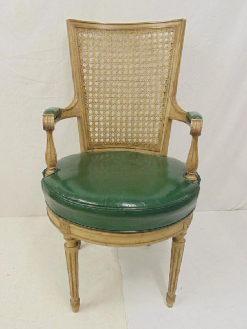 Leather seat caned back swivel armchair, pickled: Leather seat caned back swivel armchair, pickled finish, chair is 22" wide, 21" deep & 40" tall