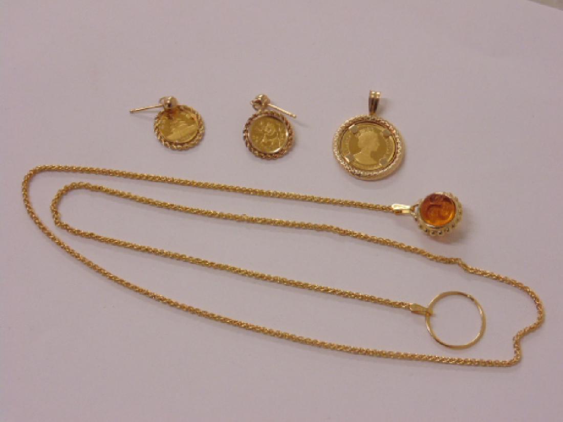 Lot of gold jewelry including 18k sun face w/ 14k chain (1 of 7)