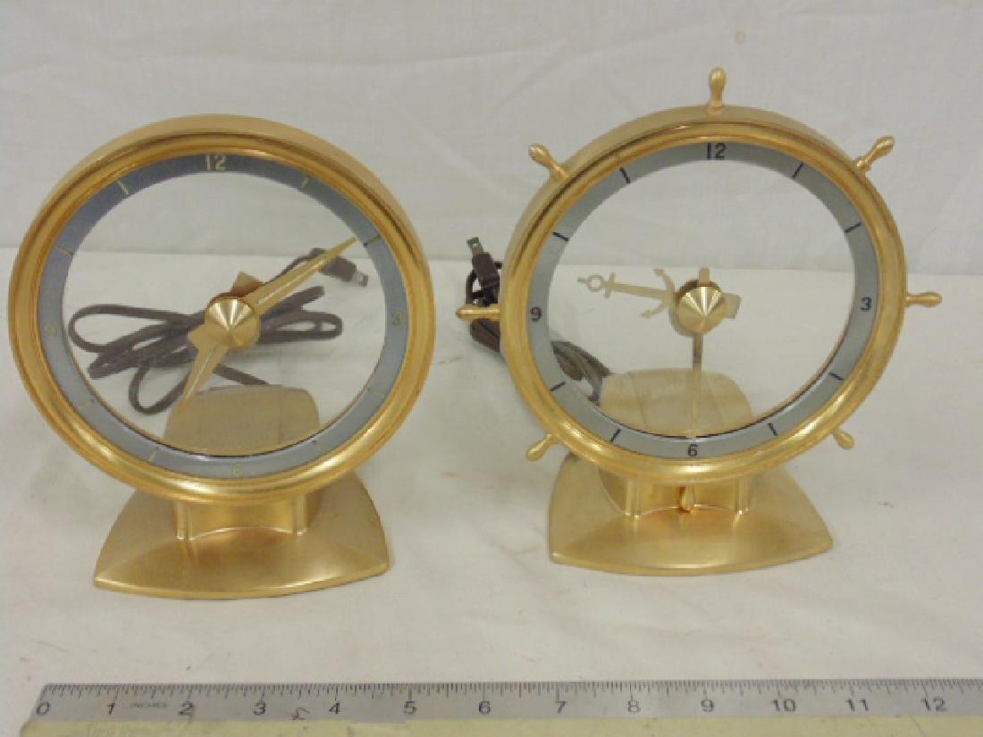 Two Jefferson Electric clocks, including "Golden (1 of 7)