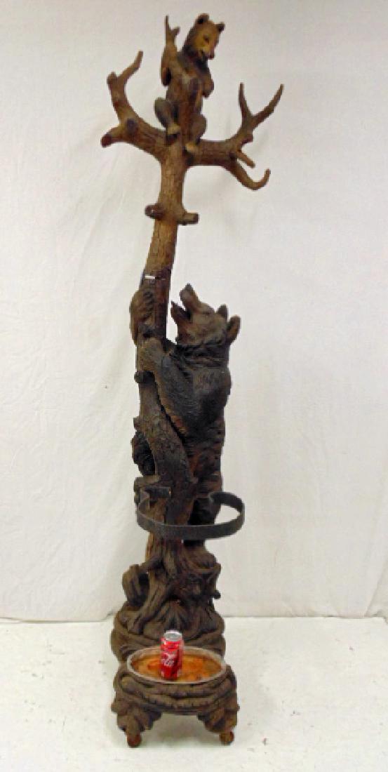 Black forest hall tree with bear & cub, a turn of the: Black forest hall tree with bear & cub, a turn of the Century Black Forest hall tree and umbrella stand with bear climbing tree to rescue her cub, 2 pieces, height is 80", some loss, notably cubs arm 