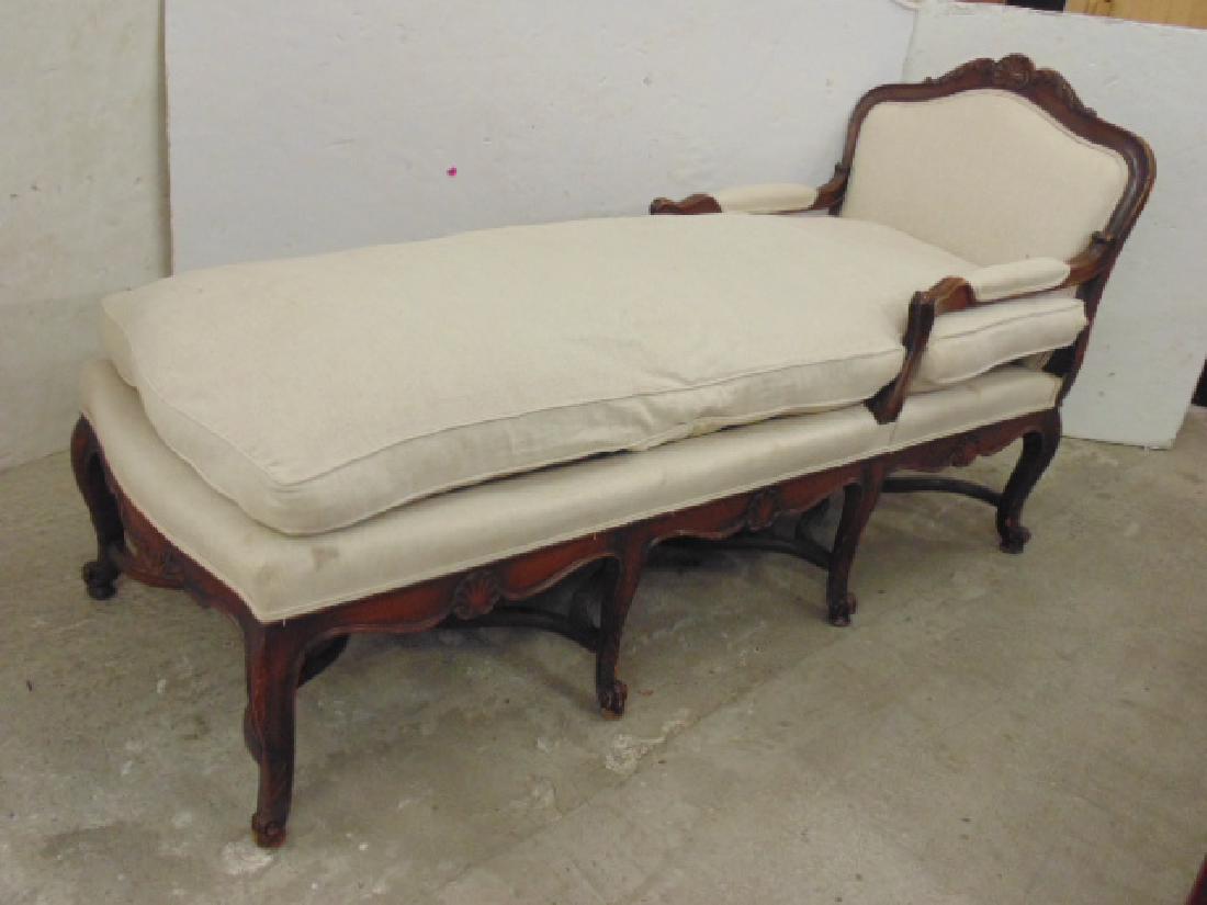 French fainting couch, carved wood stretcher base with: French fainting couch, carved wood stretcher base with 8 legs, upholstered with thick pillow seat, carved wood frame, chaise is 67" long