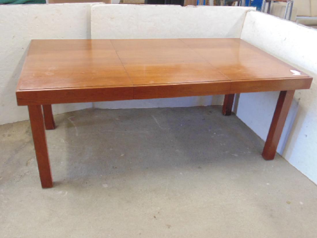 George Nelson for Herman Miller dining room table with: George Nelson for Herman Miller dining room table with 2 build in leaves and removable center panel for chafing dish, table is 72" by 40", height is 29.25", some veneer damage to bottom legs, small ch
