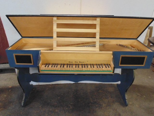 Virginal Harpsichord hand built ca. 1970: Virginal Harpsichord hand built from kit ca 1970 by Zuckerman, in blue paint, instrument sits on loose base, top is 64" by 22.5", height is 34.5".