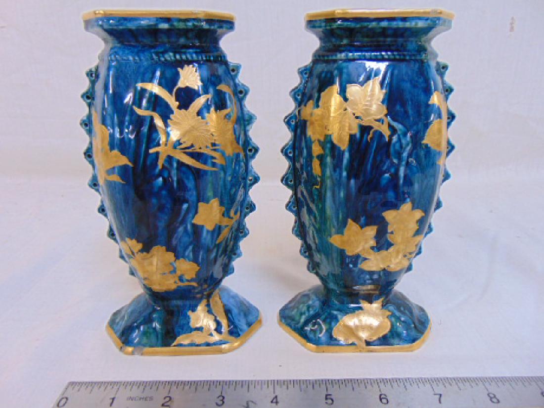 Pair early Royal Worcester vases, two enamel decorated: Pair early Royal Worcester vases, two enamel decorated Royal Worcester vases with gilt floral & leaf decoration, both vases have small chips at bottom edge, height is 6 7/8"