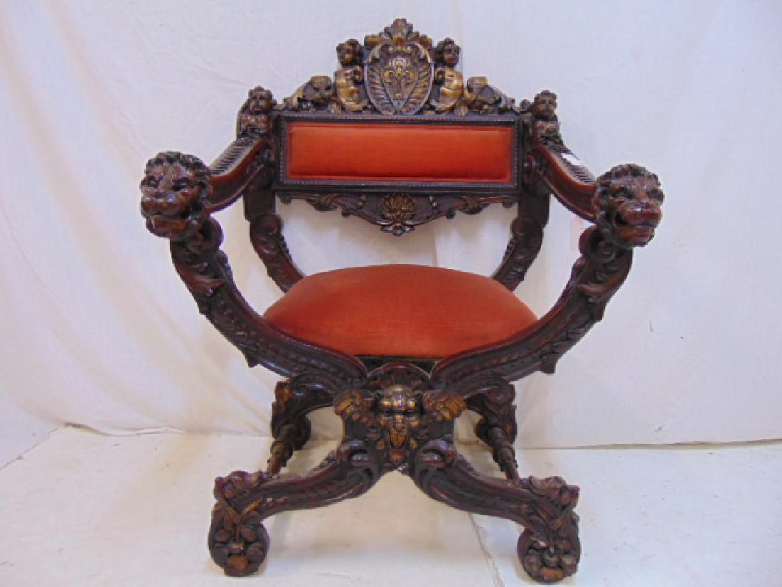 Renaissance revival armchair, ornate carved armchair: Renaissance revival armchair, ornate carved armchair with cherubs, putti & carved lions.Chair is 27" wide (measured at the lions at the end of the arm rest), 20" deep (measured at base, ground level),