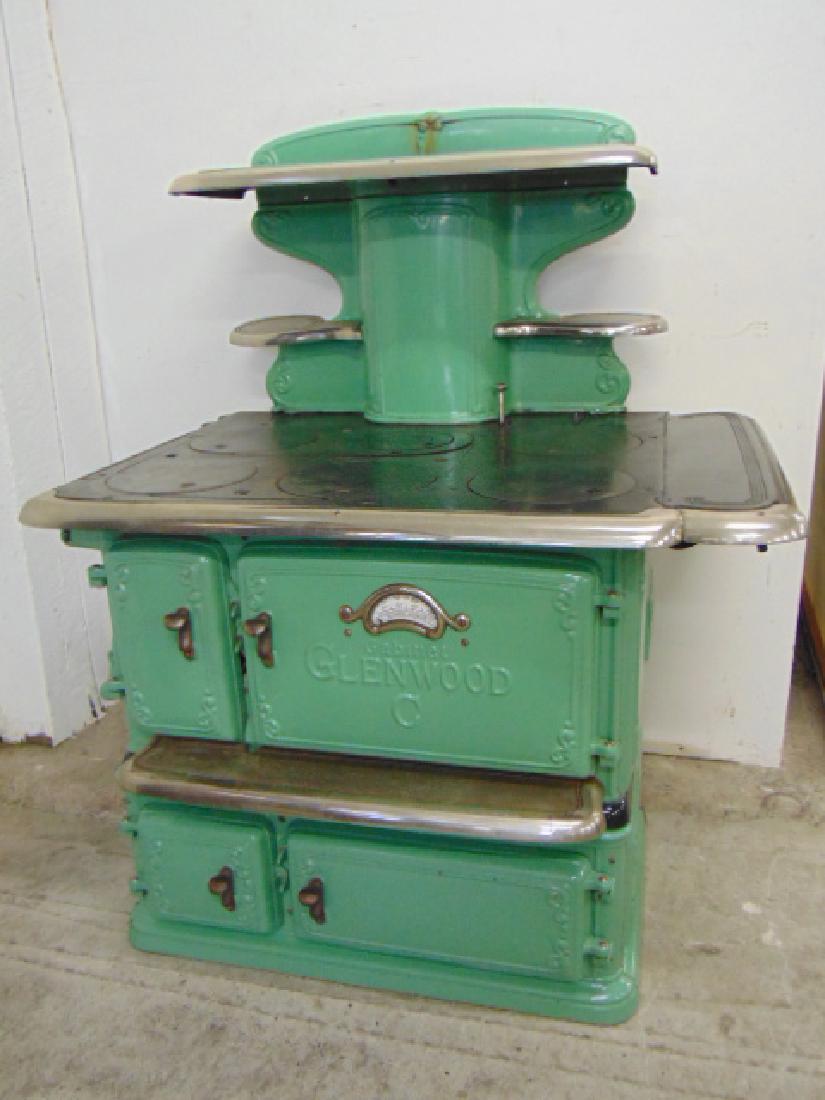 Enameled Glenwood cast iron stove, green enameled stove: Enameled Glenwood cast iron stove, green enameled stove with 6 burners by Glenwood Range co. Taunton, Mass., base is 40" by 28", height is 49.5".