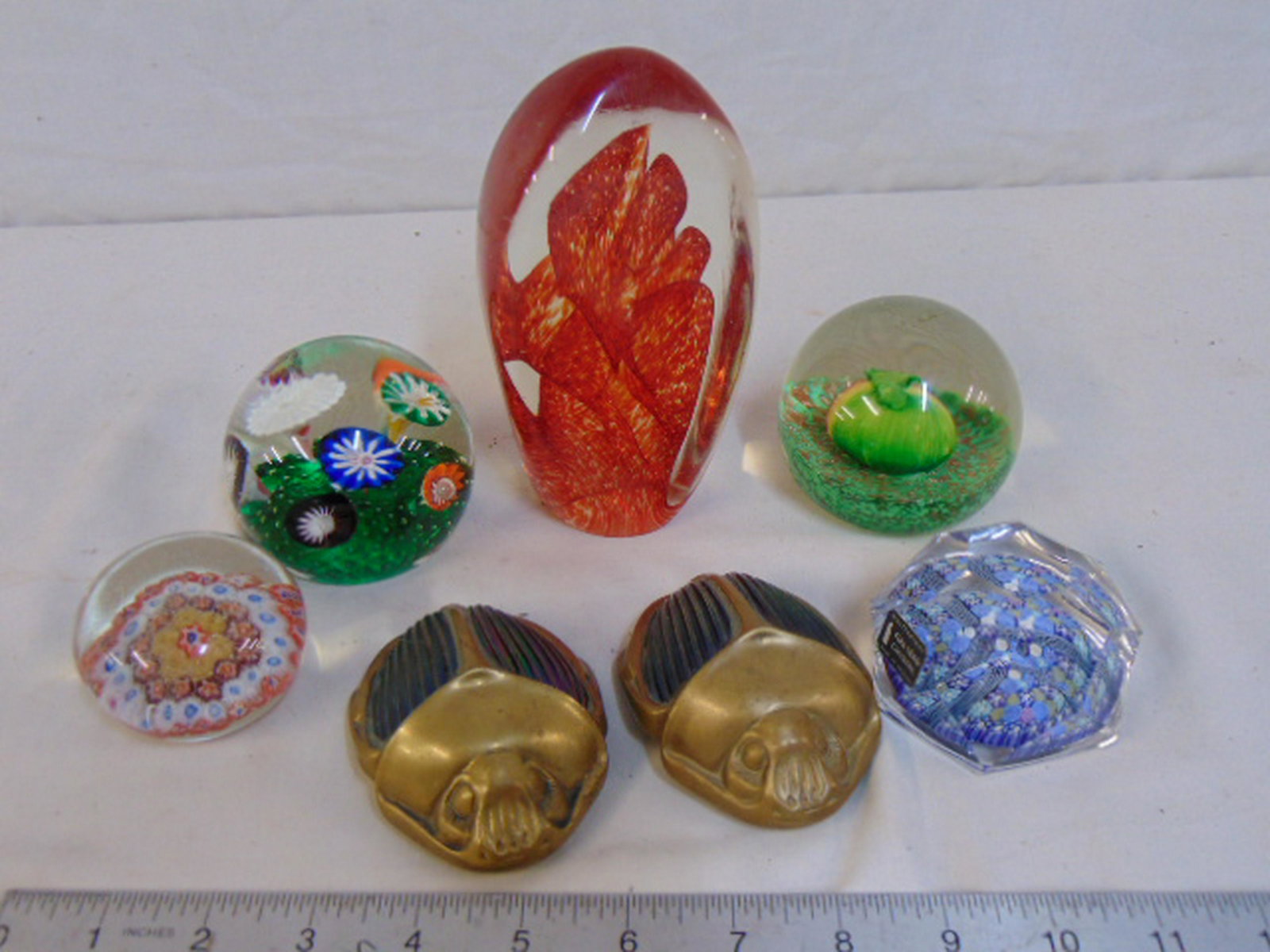 Lot 7 art glass paperweights, including two Buffalo: Lot 7 art glass paperweights, including two Buffalo Studios art glass & bronze scarabs, Whitefriars faceted paperweight & 3 unsigned.