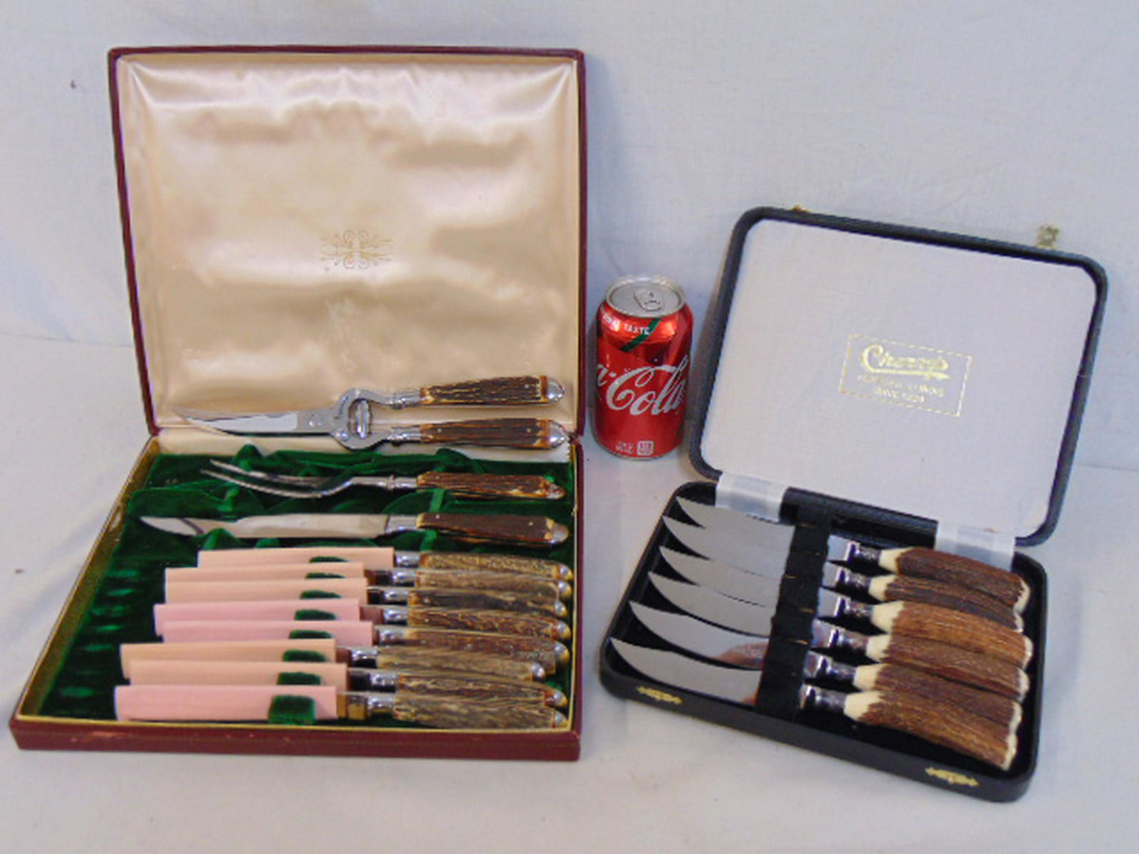 Two sets of bone handle knives , one set consists of 6: Two sets of bone handle knives , one set consists of 6 knives by Wm. Rogers, other set by Voss Cutlery Co. Germany includes 8 knifes & 3 serving pieces