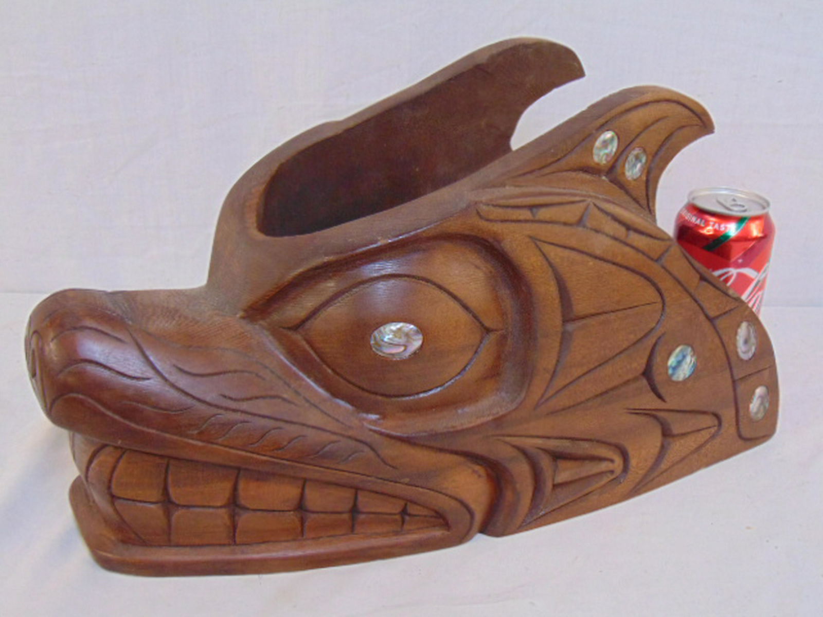 Carved wood wolf mask by Frank Paige, carved wood mask: Carved wood wolf mask by Frank Paige, carved wood mask with abalone shell decoration, mask is 16" long, 8" wide & 9" tall, signed.