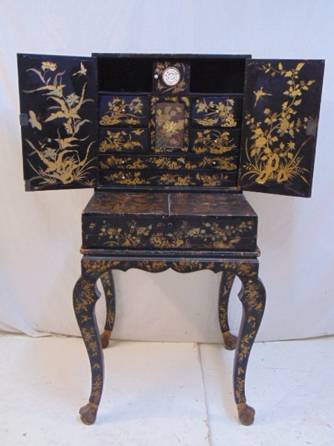 Chinese lacquered desk, gilt paint decorated, inlaid: Chinese lacquered desk, fine quality black lacquered sectional (travel) desk decorated with gilt painted flowers, birds & figures, gilt paw feet, decorated all around, interior has inlay, embroidered