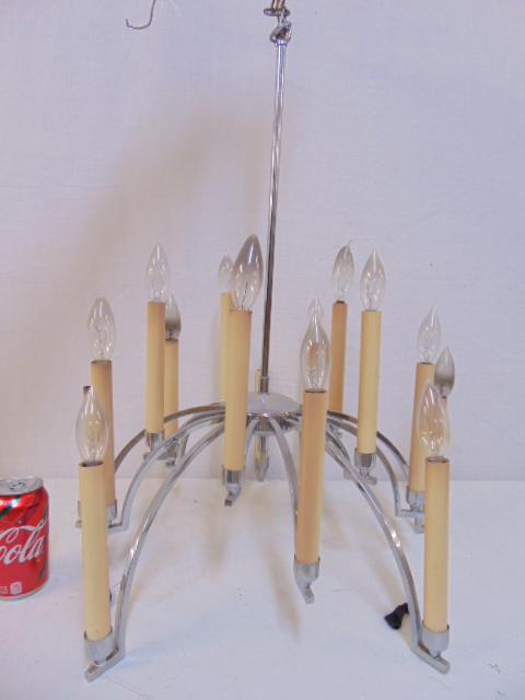 Lightolier MCM hanging fixture, chrome fixture with: Lightolier MCM hanging fixture, chrome fixture with candle sockets, height is 26" diameter is 20"