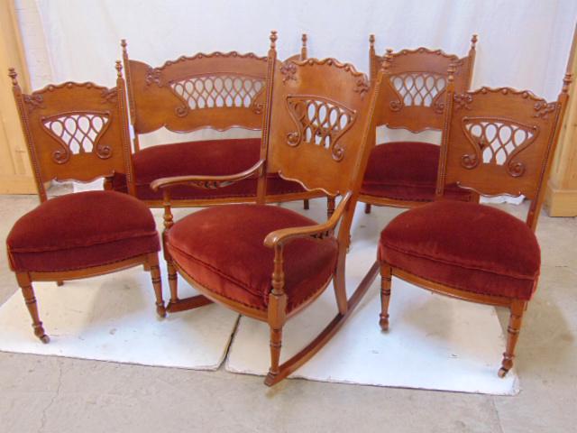5 piece parlor set, 5 piece oak parlor set with: 5 piece parlor set, 5 piece oak parlor set with loveseat, 2 side chairs, armchair & rocker, red upholstered seats, some minor scuff marks, scratches, otherwise in good condition.