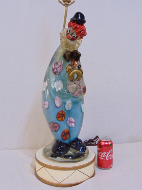 Large Murano clown table lamp, manner of Archimede: Large Murano clown table lamp, manner of Archimede Seguso, Italian art glass table lamp with clown holding a cat, no shade, lamp is 23" tall (base to top clown, excluding socket extension), clown in g
