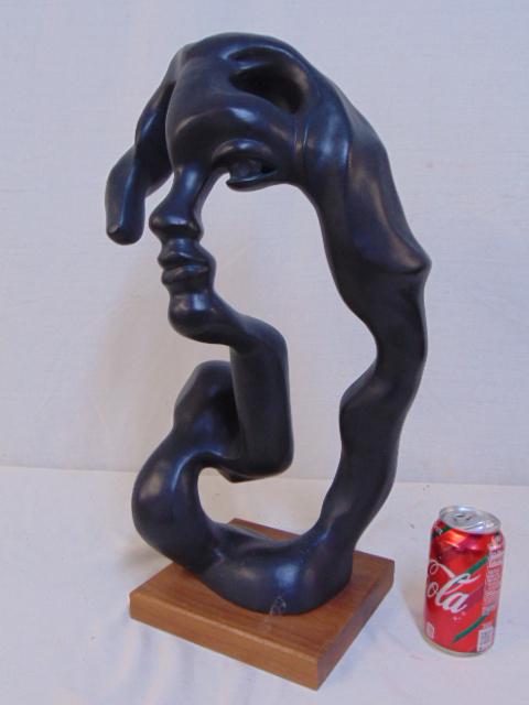 Surreal sculpture, Klara Sever, (Czech American artist: Surreal sculpture, Klara Sever, (Czech American artist ), "Portrait of a Woman." in black patinated plaster on a wood, base is 8" by 7.5", height is 21.75"