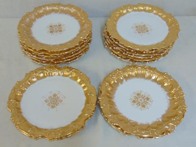 Set of 16 T&V porcelain gold rimmed plates, 9.5" in: Set of 16 T&V porcelain gold rimmed plates, 9.5" in diameter, some wear of gilt, marked "Berlin Souvenir T&V, France, Depose"