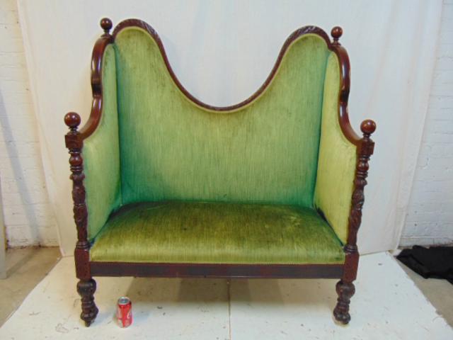 Empire loveseat, curved back empire loveseat in green: Empire loveseat, curved back empire loveseat in green upholstery with carved mahogany frame, loveseat is 48" by 21.25", height is 53"