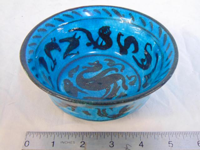Carl Walters decorated bowl, low bowl in blue & black: Carl Walters decorated bowl, low bowl in blue & black decorated with stylized animals, dated 1949, 2.5" by 5.5"