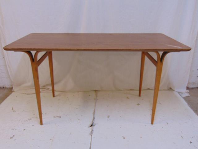 Bruno Mathsson MCM table, Firma Karl Mathsson, made in: Bruno Mathsson MCM table, Firma Karl Mathsson, made in Varnamo, Sweden, bentwood split legs, top is worn, some veneer damage, table is 55" by 27.5", height is 28.25"