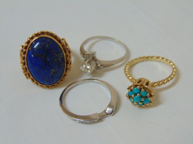 (4) 14k rings Lapis, Turquoise, & diamond wedding set: (4) rings, 14k lapis ring size 7, leaf design on side gallery, 9.9 grams. 14k turquoise ring size 7, 4 grams, with 7 small beads of turquoise. 14k white gold diamond wedding set size 8, 4.9 grams.