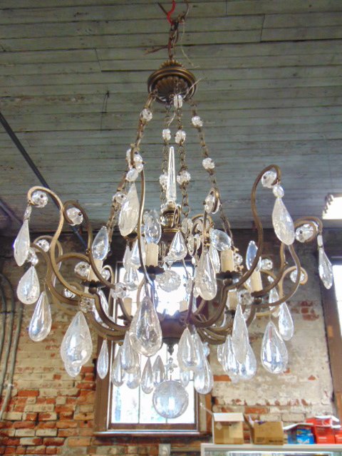 Rock crystal chandelier with two matching wall sconces,: Rock crystal chandelier with two matching wall sconces, 34" tall chandelier with fine quality cut rock crystals, one crystal missing, one is replaces, comes with two wall sconces, matching design, eac