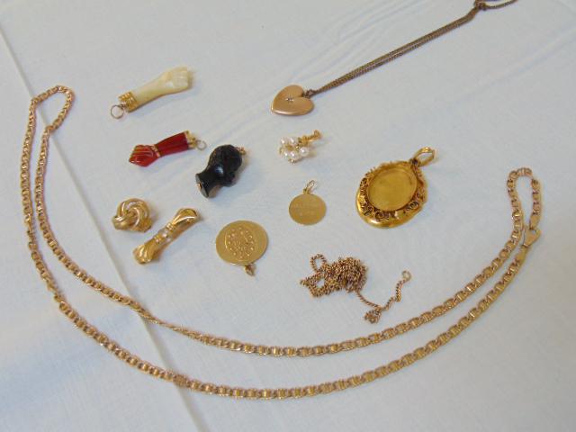 Jewelry. Gold lot to include 9 kt. gold necklace marked: Jewelry. Gold lot to include 9 kt. gold necklace marked 375, 19.6 grams, 30" length; 14k locket 5.7 grams; 14k heart locket w/ small diamond chip, 3.6 grams (chain is not gold); (2) 14k pendants 5 gra