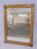Beveled glass mirror in gilt frame, carved frame,