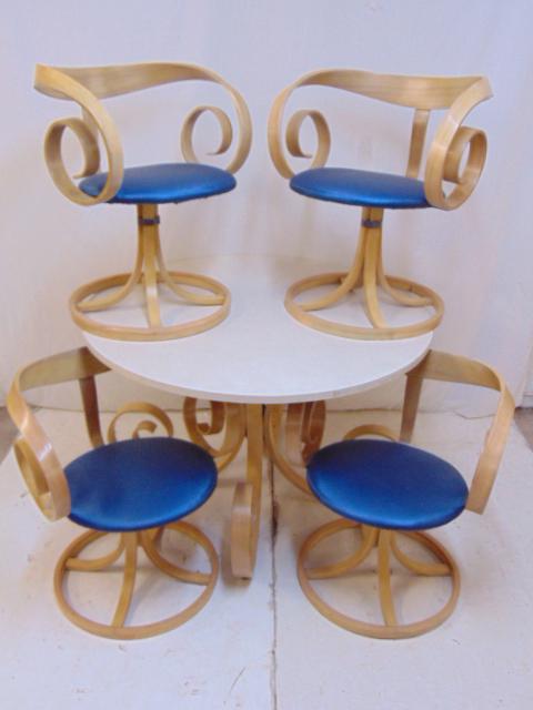 George Mulhauser designed Plycraft dinette set, 4: George Mulhauser designed Plycraft dinette set, 4 chairs & Formica top round table, table is 41.75" in diameter, height is 28", distinct curl base, each chair is 22.5" wide, 20" deep & 26" tall, struc