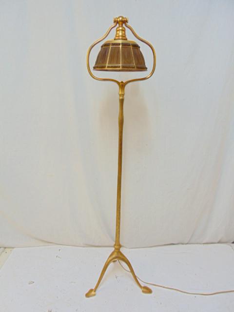 Tiffany facsimile linen fold floor lamp, gilt patina: Tiffany facsimile linen fold floor lamp, gilt patina floor lamp with amber linen fold shade, in good condition, height is 55", shade diameter is 9.25".