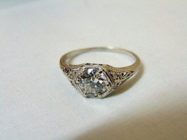 Jewelry. Diamond platinum ring 1.10 EGL cert. G-H, VS2: Diamond platinum ring 1.10 with EGL cert. G-H color, VS2, size 7 1/2, 2.9 grams, shank slightly bent.