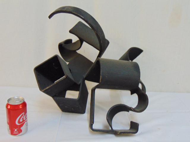Iron sculpture, abstract design, in black paint,: Iron sculpture, abstract design, in black paint, unsigned