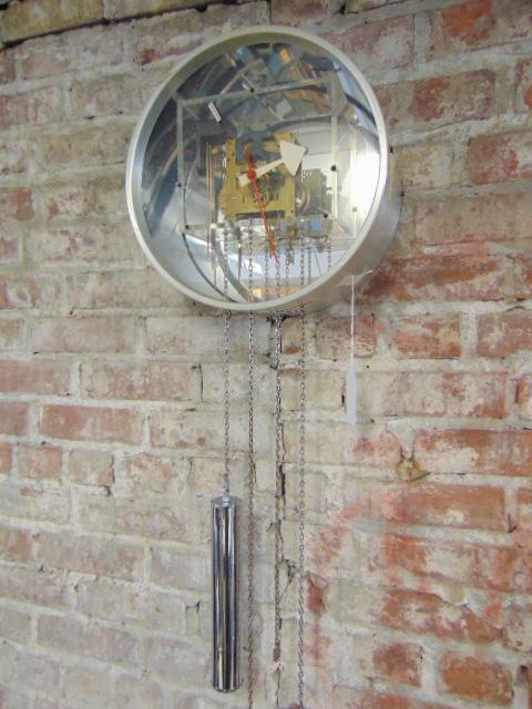George Nelson for Howard Miller wall clock, MCM, chain: George Nelson for Howard Miller wall clock, MCM, chain loose, pendulum missing, all but two minute marks are missing, sold as found, diameter clock is 12"