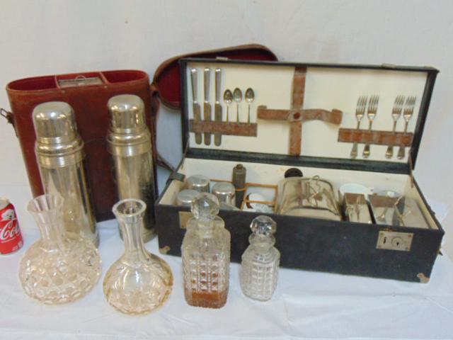 Finnigan Makers picnic trunk, thermos set in leather: Finnigan Makers picnic trunk, thermos set in leather case & decanters, vintage Finnegan's picnic set consisting of cups, cutlery, porcelain butter & preserve jars, several metal covered containers & m