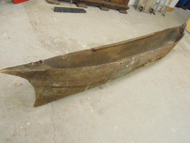 Early Polynesian? Dug out canoe, carved out of single: Early Polynesian? Dug out canoe, carved out of single piece, repair at front, canoe is 11'7" long, approximately 17" wide. Various decoration barn find upstate NY