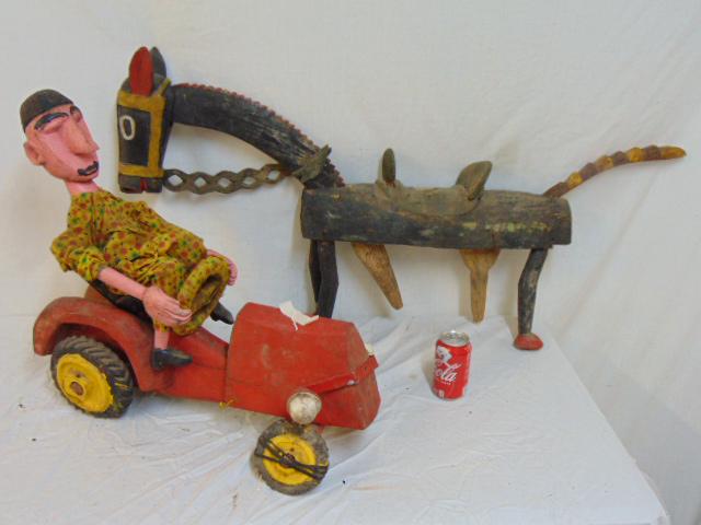 Carved wood figure on tractor & horse, 2 carved wood: Carved wood figure on tractor & horse, 2 carved wood figures, pain decorated, man riding a tractor & carved wood & painted horse, horse as is, legs need repair.