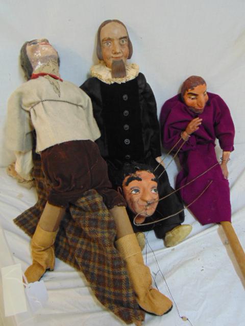 3 puppets, carved wood & paper Mache, comes with one: 3 puppets, carved wood & paper Mache, comes with one extra head.