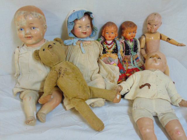 Lot vintage composite dolls & teddy bear, 4 composite: Lot vintage composite dolls & teddy bear, 4 composite dolls, all as is, chipped, need restoration, old teddy bear & 2 ethnic dolls.