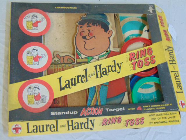 Laurel & Hardy ring toss game, by Transogram, complete,: Laurel & Hardy ring toss game, by Transogram, complete, corners of box torn, appears complete.