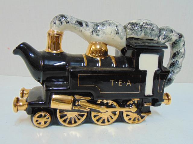 Tony Carter Limited edition Railroad teapot, black &: Tony Carter Limited edition Railroad teapot, black & gilt porcelain, 924/2000, good condition