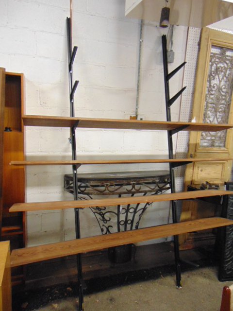 Wall shelf, Mid Century, metal adjustable rails with 7: Wall shelf, Mid Century, metal adjustable rails with 7 wood shelves, shelves are 72" by 11.5", rails are 95", tension bases.