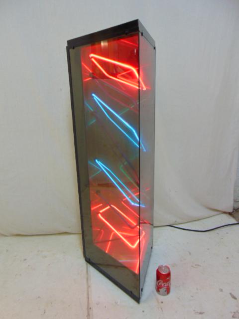 Neon sculpture, triangular glass enclosed, partial (1 of 4)