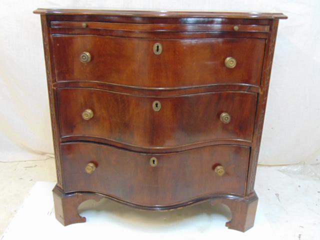 Antique serpentine front silver chest, with pull out: Antique serpentine front silver chest, with pull out work shelf, English 3 drawer mahogany Chippendale chest, strong serpentine curved front, old repairs to front legs, rear right side has split, smal
