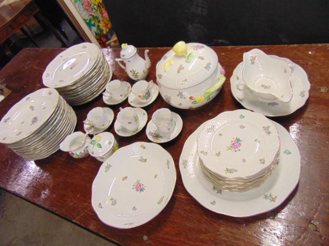 Lot Herend porcelain dinnerware, floral decorated,: Lot Herend porcelain dinnerware, floral decorated, includes one tureen with lid, gravy boat with under plate, teapot, sugar and creamer, 5 cups and saucers, round vegetable dish, serving plate, 13 dee