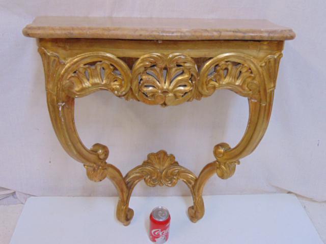 Small marble top gilt console table,, carved wood &: Small marble top gilt console table,, carved wood & gilt French console table, 26" tall, top is 25" wide, depth is 11.5", late 18th Century. Notice: Please note that our auctions will continue in the 