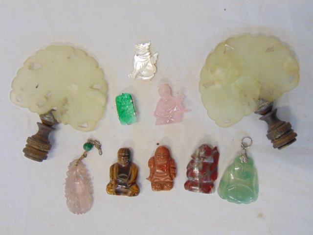 Asian jade, carved hard-stone lot, Buddha, finials: Asian jade, carved hard-stone lot, Buddha, finials.Includes two jade fan shaped finials (one is cracked), repaired, green jade pendant & small pin, several stone Buddhas & small mop dog, see quarter i