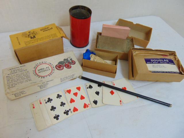 Magic lot, various vintage magician items including: Magic lot, various vintage magician items including "Magical Surprise"; "Egg Bag"; trick playing cards, "Al Baker's improved plate biting stunt" & more, also includes Mod-AC Models kit of a George B. 