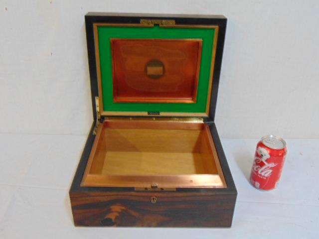 Alfred Dunhill humidor, rosewood exterior, copper lined: Alfred Dunhill humidor, rosewood exterior, copper lined interior, some exterior scratches, interior is in good condition, humidor is 12.25" by 10 3/8", height is 5.5"